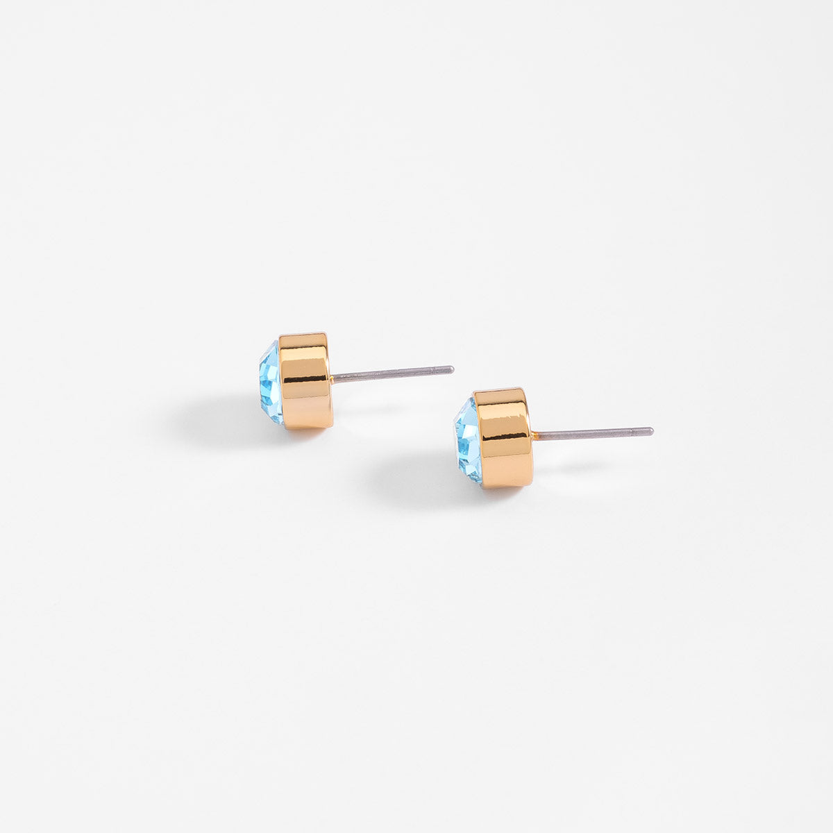 Aretes en baño de oro con piedra azul diseño poste, foto 3 de 6