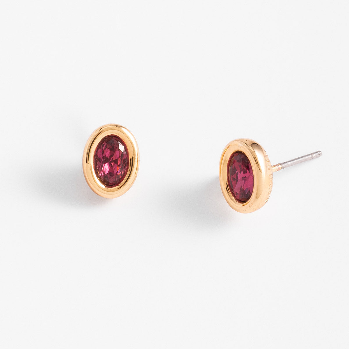 Aretes pequeños con piedra rosa ovalada en baño de oro, foto 2 de 5
